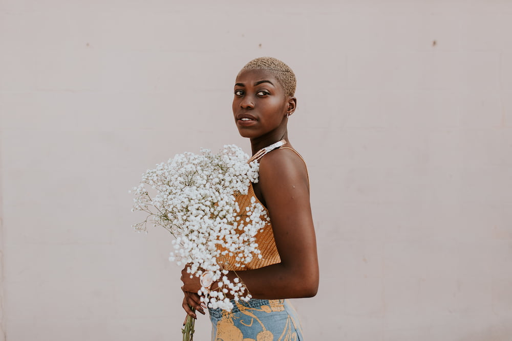 Beautiful African American Woman With Bouquet Of Gypsophila