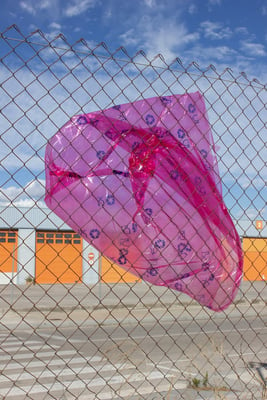A pink plastic bag in an industrial setting