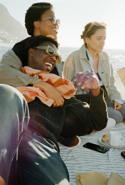 A group of friends having fun together while on vacation in a small coastal town near Cape Town 35mm film