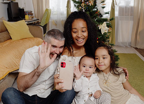 Multiracial Family Taking Selfie At Home