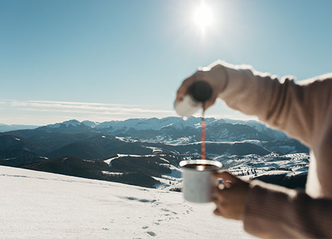 Coffee to go on the snowy mountain